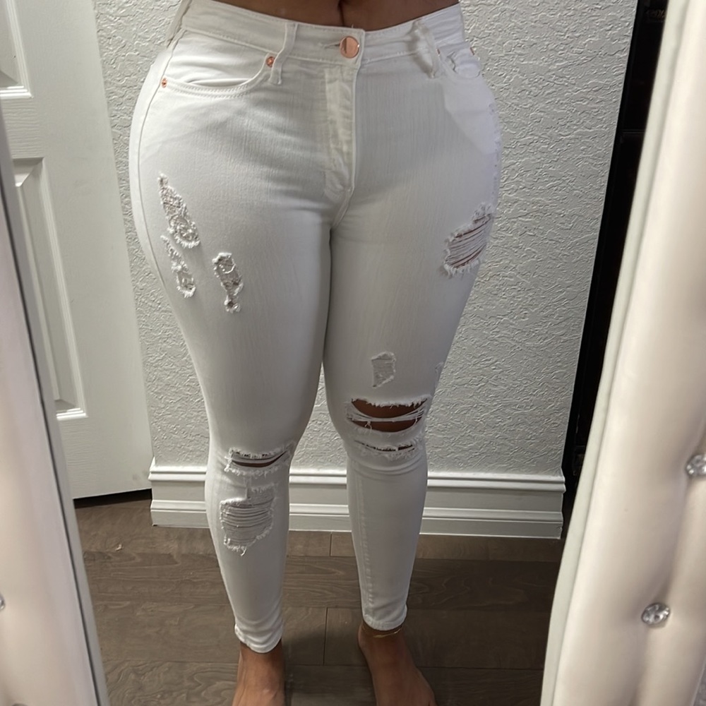 White ripped jeans lime new only one time im use